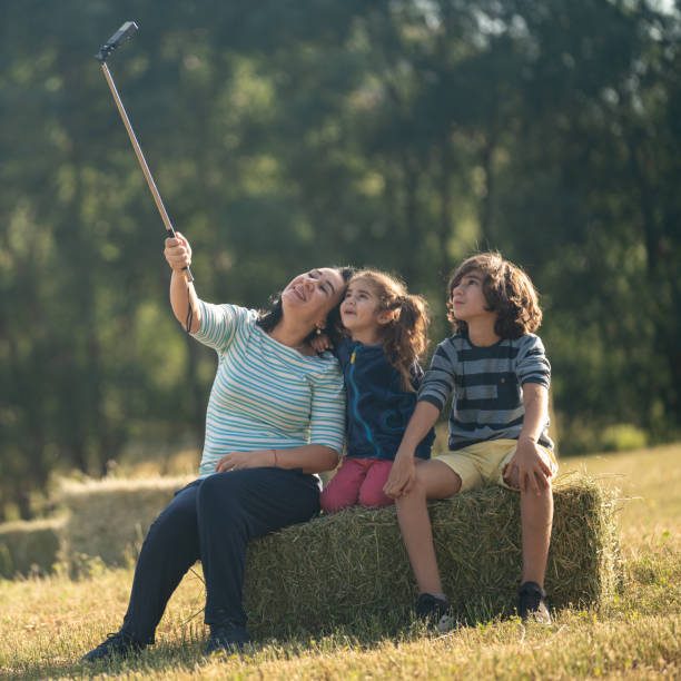 mother and children playing outside